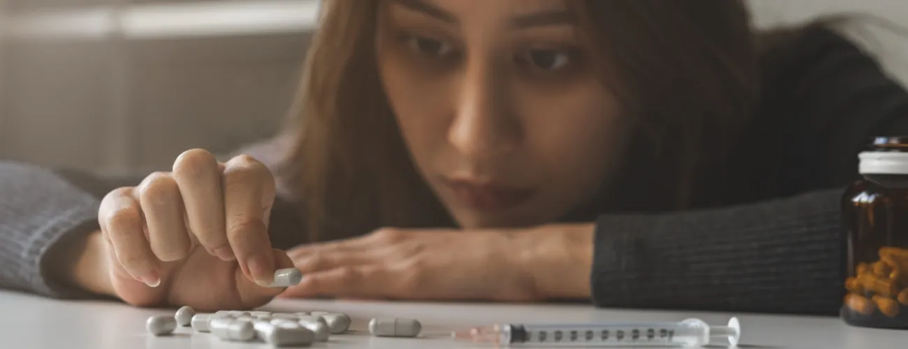 Une femme dépendante aux antidouleurs