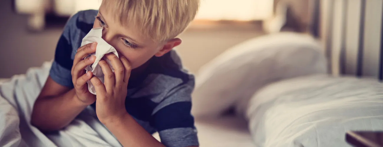 enfant qui se mouche
